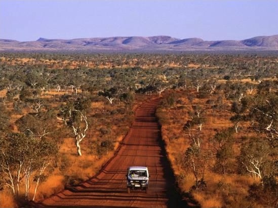 Car on Outback Road, Karijini National Park, Australia