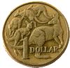 Australian money: one dollar coin. Australian money: one dollar coin.