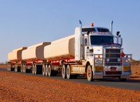 A road train pulling three tanks