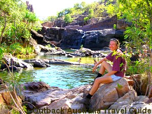 Sitting at the top of a waterfall in the Australian Outback.